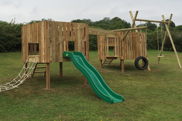 Wooden outdoor climbing set: This climbing set started out as not much more than a lorry-load of timber. If you tell us how big you want it and what accessories you would like - slide, swings, rope ladders etc - we'll build you a castle that will give children years of fun outdoor play.